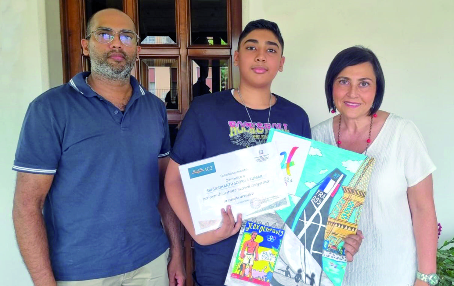 Sri Siddhanth con il padre e la maestra Mangano